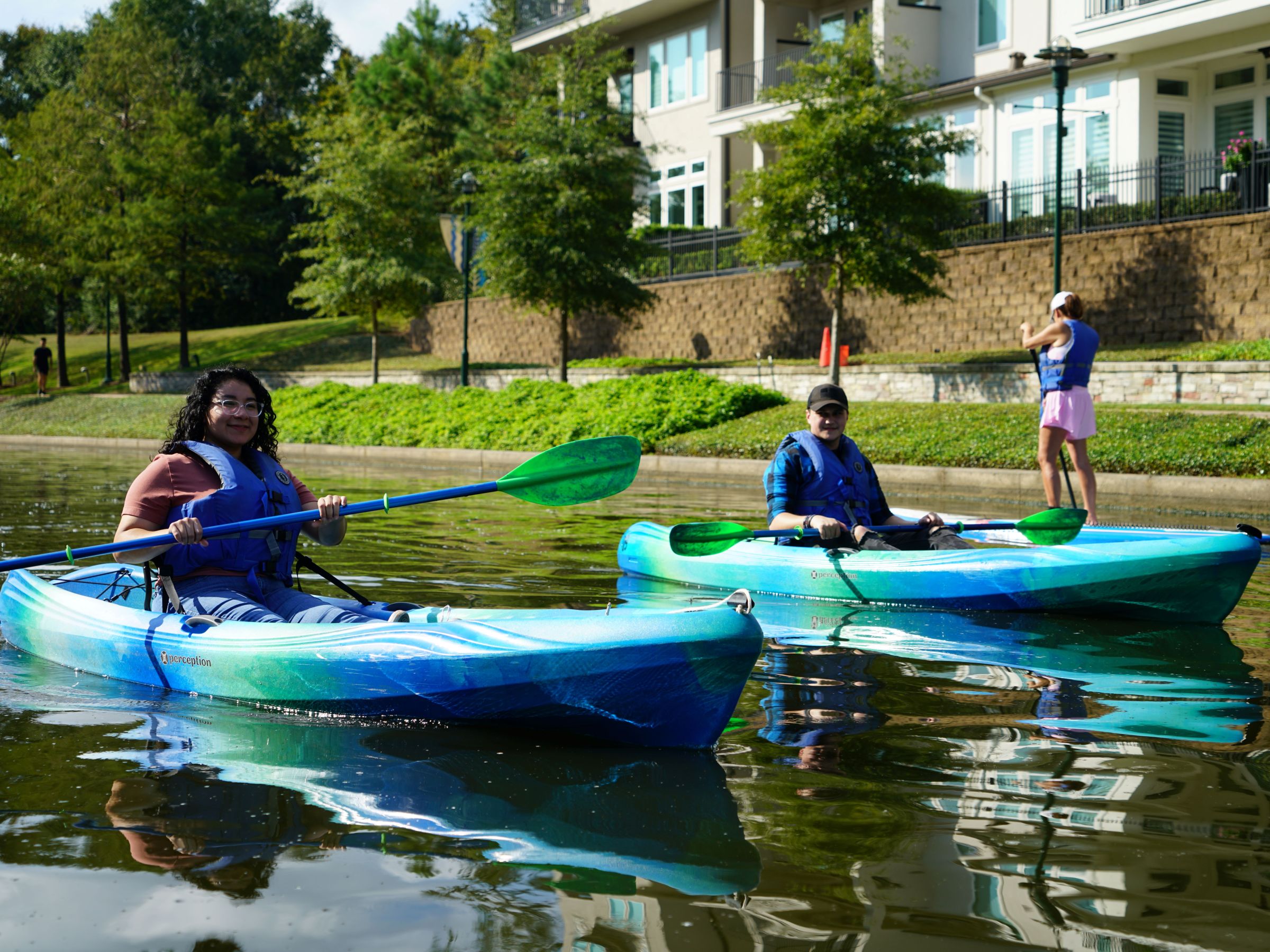 a group of people riding on the back of a boat