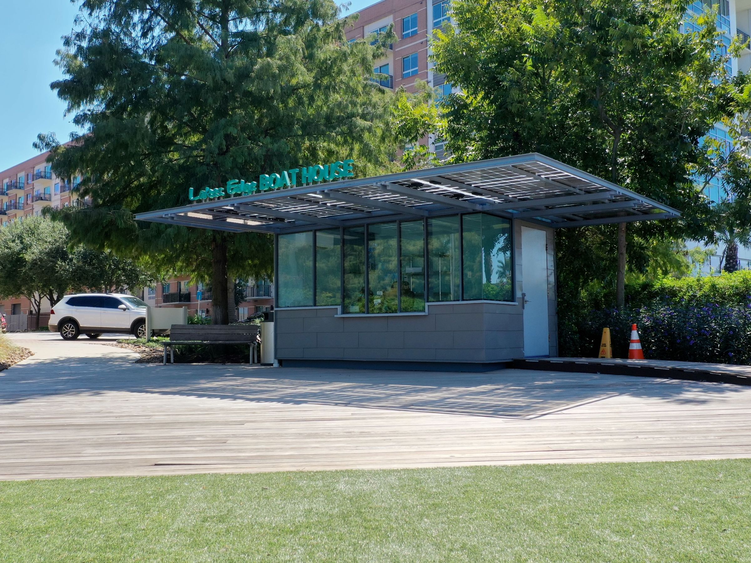 a large lawn in front of a bus