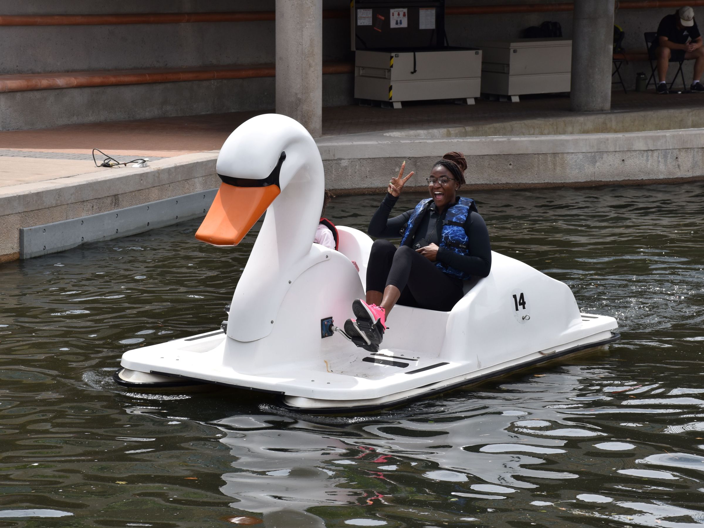 a couple of people that are sitting in the water